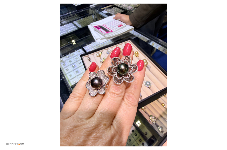 Esther showing some pearl jewelry as finished products, also available at the Japan Pearl Fair